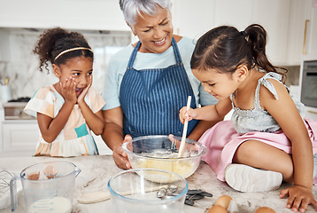 Image showing Learning, grandmother and cooking girl in kitchen mixing baking dough in bowl in home. Education, family wow and surprised kid with grandma teaching children how to bake for child development