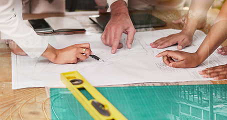 Image showing Hands, blueprint and architecture with a design team planning on a table using a floor plan. Building, strategy and collaboration with an engineer employee group at work on project development