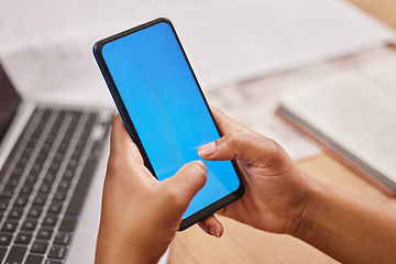 Image showing Person, hands and phone typing on mockup for advertising, marketing or communication at the office desk. Hand of employee on mobile smartphone with blue screen display or chromakey for advertisement