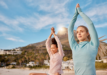 Image showing Yoga, mockup and meditation friends on the beach together for mental health, wellness or inner peace in summer. Exercise, diversity or nature with a female yogi and friend meditating outside