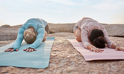 Image showing Yoga, women or childs pose on beach mat in workout, training or bonding exercise for back pain. Relax, stretching or yogi friends in nature pilates, fitness flexibility or healthcare wellness on rock