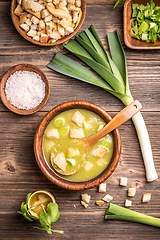 Image showing Delicious leek soup in wooden bowl