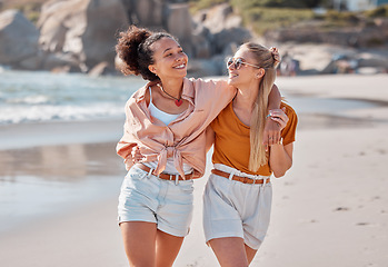 Image showing Couple on beach, lesbian and happy with travel, gay women hug outdoor with adventure and freedom to love by ocean. Interracial relationship, holiday in Australia and lgbtq with commitment happiness