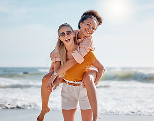 Image showing Piggyback, beach and couple of friends in portrait for lgbtq, lesbian or gay love, freedom on summer vacation. Blue sky, ocean and diversity women on date, fun support and excited valentines holiday