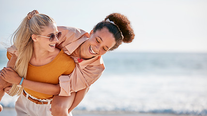 Image showing Piggyback, friends and women at beach on holiday, vacation or summer trip outdoors. Travel, diversity and girls or females having fun, laughing at joke and enjoying time together by ocean or seashore