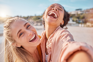 Image showing Selfie, laughing and portrait friends at the beach for bonding, weekend and holiday in Miami. Happy, comic and women with a photo for vacation memory, travel and happiness by the sea in summer