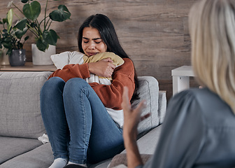 Image showing Counseling, psychology woman and patient crying in therapy for mental health problem, depression or anxiety. Sad, depressed or trauma client, consulting professional therapist or psychologist on sofa