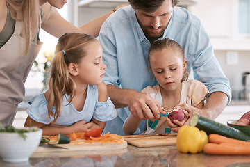 Image showing Cooking, kitchen and parents with children with vegetables for healthy lunch, food nutrition or meal prep together. Family, chef skills and dad with girls learning, teaching and help cut ingredients