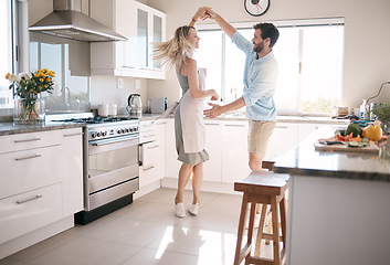 Image showing Couple, bonding or dancing in kitchen, house or family home in support, love or trust in fun activity, energy freedom or celebration. Smile, happy or dancer man and woman in romance marriage ballroom