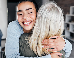 Image showing Love, comfort and woman hugging her mother for support, peace or consoling in their family home. Happy, smile and young lady embracing her mature mom with care, happiness and affection at their house