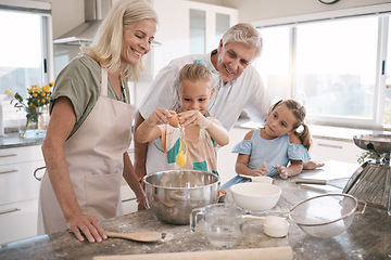 Image showing Family, bonding or baking children and eggs, flour or wheat in kitchen, house or home of pastry, dessert cake or food. Happy, grandparents or cooking kids learning a bakery pudding or cookies recipe