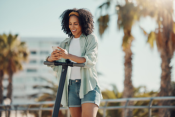 Image showing Technology, scooter and black woman with phone in city for social media, texting or web scrolling. Travel, communication and female with electric moped and 5g smartphone laughing at meme in street.