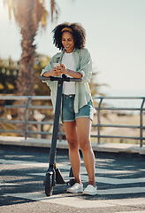 Image showing Travel, scooter and black woman with phone in city for social media, texting or web scrolling. Technology, communication and female with electric moped and mobile smartphone for networking in street.