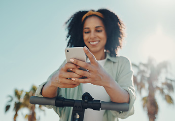 Image showing Phone, scooter and black woman with technology in city for social media, texting or internet browsing. Travel, communication and hands of female with electric moped and 5g smartphone for networking.