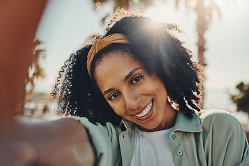 Image showing Portrait, selfie smile and happy black woman taking pictures to remember memory, social media or profile picture. Face, beauty and female from South Africa talking photo outdoors in nature or park.