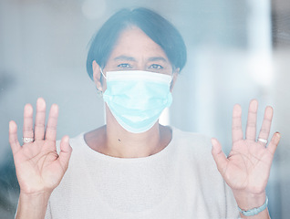 Image showing Old woman, face mask and Covid with health and safety, sad portrait with hands on window and isolation. Retirement, lockdown and compliance with law, healthcare rules and hygiene to stay healthy