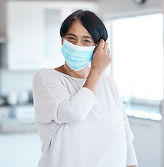 Image showing Senior woman, Covid and healthcare, face mask removal and portrait at home, end of health rules and safety from virus. Retirement, wellness and compliance, protection and hygiene to stay healthy