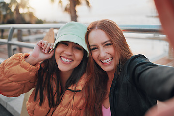 Image showing Selfie, freedom and portrait of friends on vacation in the city for summer fun and bonding. Happy, travel and women with smile taking picture together outdoor in town while on holiday or weekend trip