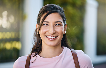 Image showing Woman, travel and portrait of a young person from Japan with a smile and blurred background. Backpack, happiness and freedom of a female in summer on a urban adventure for traveling on vacation