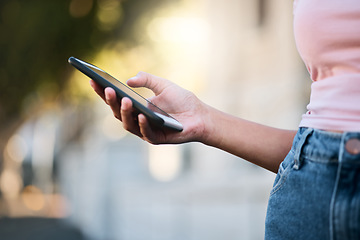 Image showing Phone, woman hand and mobile networking of a person doing urban travel with 5g connection. Digital gps, hand and zoom of a young person on social media or reading a text with blurred background