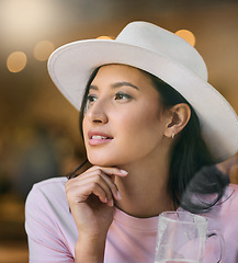 Image showing Thinking, woman and restaurant of a young person with a beer glass with bokeh light. Beautiful, contemplating and female with a memory and idea at a coffee shop contemplating travel in a cafe