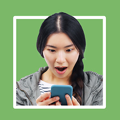 Image showing Asian woman, wow and phone with frame border with green background looking at mobile text. Online communication, digital news and shocked face of a young person surprised on cellphone with wifi