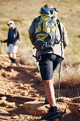 Image showing Senior hiking, nature and elderly men walking on a mountain path outdoor for cardio. Friends, exercise and workout in summer of an old man back on a journey and adventure in the mountains for fitness