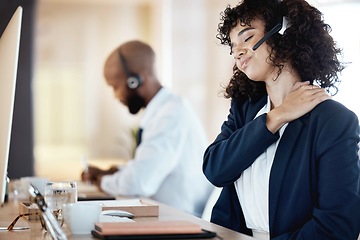 Image showing Business, black woman and neck pain in call center, burnout and telemarketing for customer service. Corporate, female agent and consultant with muscle tension, fatigue and strain in modern office