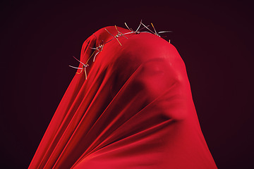 Image showing Red fabric, creative aesthetic and model in a studio with face covering for religion and luxury clothing. Glamour, religious thorn crown and woman with god respect wearing vintage and silk apparel