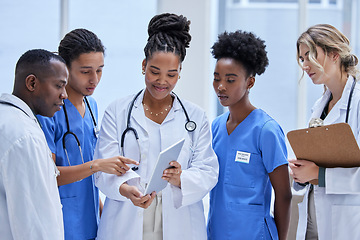 Image showing Diversity, healthcare and staff with tablet, talking and planning for procedure, teamwork and in hospital. Medical professional, team and group with device, conversation and telehealth for surgery