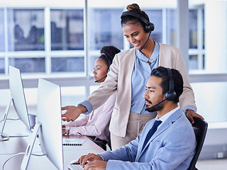 Image showing Business people, call center and mentor coaching consultant in telemarketing, sales or advice at the office. Female leader agent helping employee in contact us for customer support or service at desk