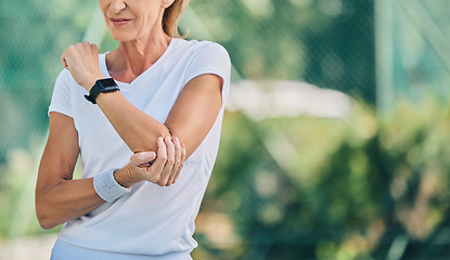 Image showing Fitness, arm pain and tennis training with a mature woman on a outdoor court with mockup and injury. Fitness, wellness and workout inflammation of a athlete with joint and muscle problem from sport