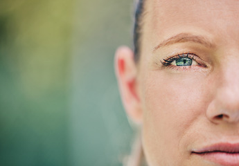 Image showing Half, face and portrait of a woman at tennis with vision, motivation and serious about a game. Mockup, focus and sports player looking serious while playing sport on a court and bokeh background