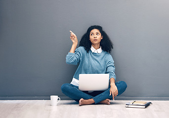 Image showing Laptop, research and pointing with black woman on floor with mockup for social media, news or deal. Offer, online shopping and technology with girl customer for communication, internet or advertising