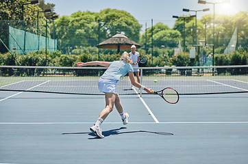 Image showing Sports, tennis and women playing a match for workout, fun or training on an outdoor court. Fitness, athletes and healthy girls practicing or doing a exercise for a game or competition at a stadium.