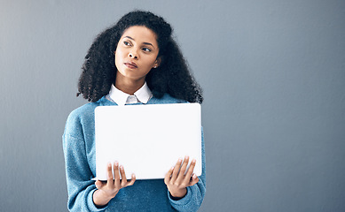 Image showing Connection, ideas and woman holding a laptop for an email, internet and communication on office wall. Contact, proposal and business employee thinking of inspiration with a pc with mockup space