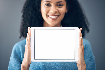 Image showing Digital tablet, mockup and portrait of black woman in studio on internet, screen or advertising on grey background. Online, communication and girl on space, display or copy on website, app or network