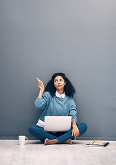 Image showing Laptop, mockup and pointing with black woman on floor for social media, news and deal presentation. Offer, online shopping ad technology with girl customer for communication, internet and advertising