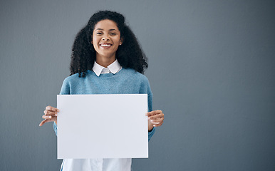 Image showing Mockup, portrait and black woman with poster for space, advertising sign and branding on grey background. Face, blank or billboard by girl relax on mock up, copy or announcement on product placement