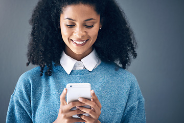 Image showing Phone, mockup and black woman in studio for internet, search or social media on grey background. Online, communication and girl texting on space, smartphone or copy space for website, app or reading