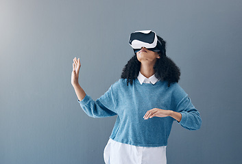 Image showing Metaverse, virtual reality headset and woman with hands for mockup space and 3d game in studio. Gamer person vr tech glasses for digital world, futuristic gaming and ux experience on grey background