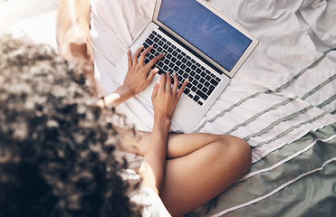 Image showing Hands, top view and typing on laptop on bed in bedroom for social media or web browsing in the morning. Technology, remote worker and woman working on project, writing email or research on computer.