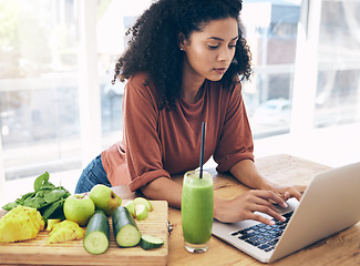 Image showing Research, smoothie and health with black woman and laptop for blog, salad and vegetables. Nutritionist, diet and food with girl by kitchen counter for cooking, technology and learning at home