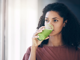 Image showing Healthy, diet and woman drinking a smoothie for weight loss, energy and breakfast while thinking. Food, health and girl with a juice cocktail for nutrition idea, green detox and vegan lifestyle