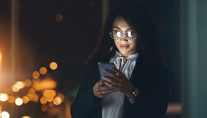 Image showing Email, night and woman reading on a phone, communication and internet for business. Connection, social media and employee with a mobile in a dark office for the web, networking and overtime schedule