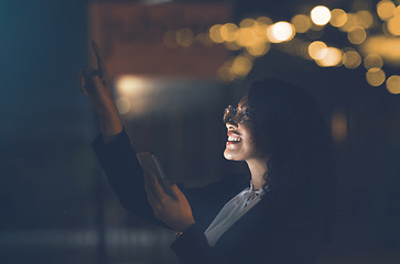 Image showing Phone, dark and black woman outdoor checking stars and solar system with mobile app. Happy, smile and young person in city pointing to star constellations at night with cellphone and web connection