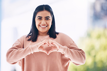 Image showing Heart hands, portrait and happy woman for self care, cardiology wellness and gen z support for women health. Face of a young Indian person with love emoji, sign or gesture for like, vote and smile