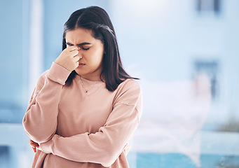 Image showing Headache, stress or anxiety with an indian woman on a blurred background suffering from pain or burnout. Compliance, mental health or mistake and a frustrated young female struggling with a migraine