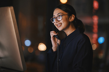 Image showing Phone call, computer and talking woman at work for communication, planning and networking at night. Corporate, connection and a business employee speaking on a telephone with a pc in the dark