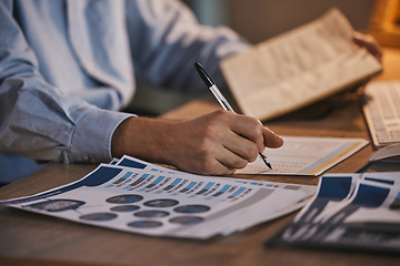 Image showing Business man, writing and data analytics with documents or paperwork with finance information. Hand of person at desk for research, trading and stock market infographic paper for planning or analysis